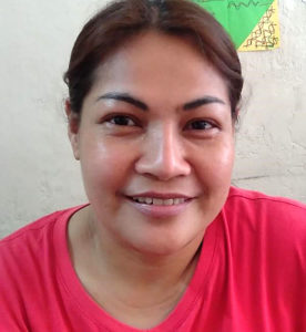 Mary Ann runs a food business and retail store through our microfinance program.